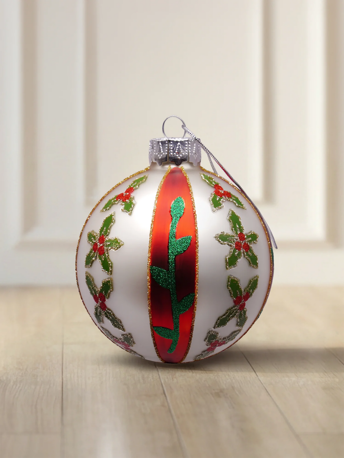 ArtiTree glass bauble 8 cm in matte white with holly blossoms, red stripe and gold glitter