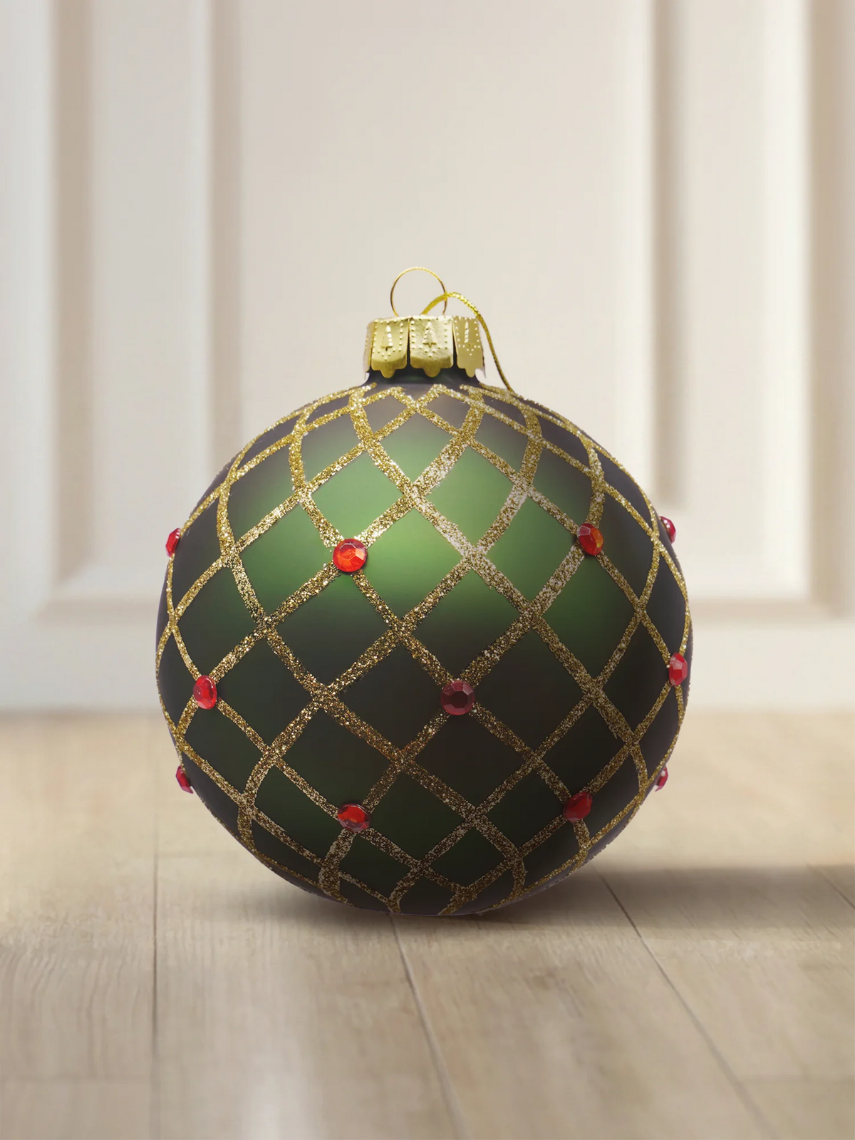 ArtiTree glass bauble 10 cm in matte dark green with a golden diamond lattice and red decorative stones