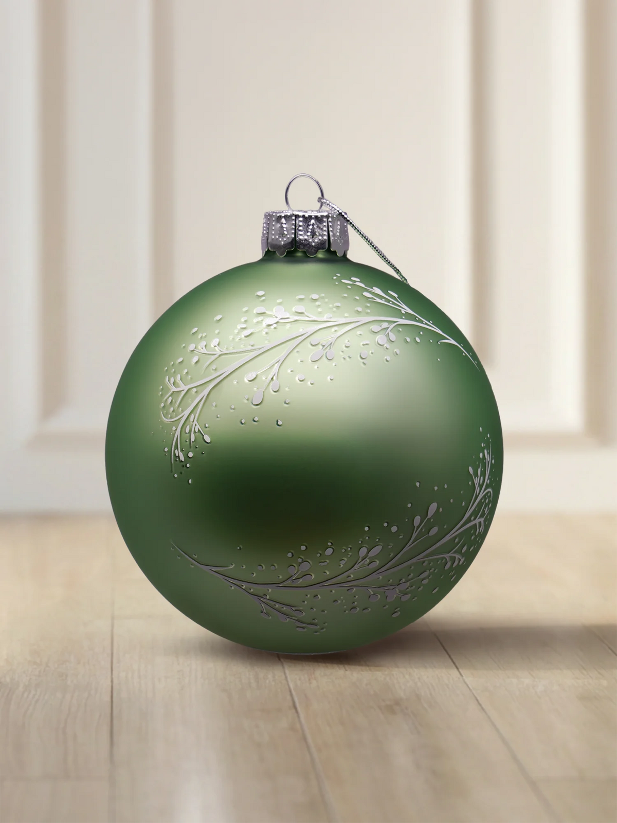 ArtiTree glass bauble 10 cm in matte sage green with white branches and a frosted pattern