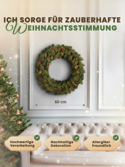 Kunstkerstkrans van 60 cm van ArtiTree met maataanduiding, aan een witte muur naast een versierde kerstboom