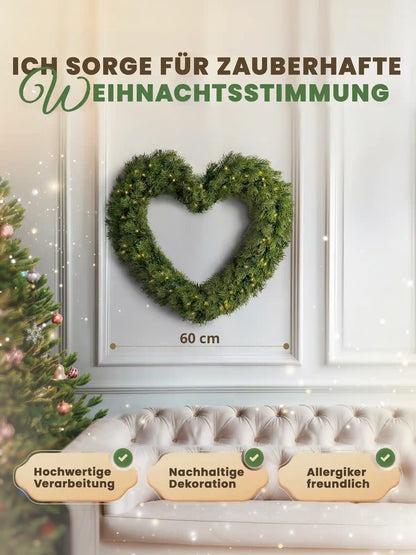 Artificial heart-shaped Christmas wreath, 60 cm, by ArtiTree, with dimensions shown on a white wall